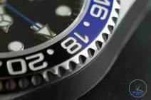 Review of the Rolex GMT Master II [116710BLNR] aka ‘The Batman’ Close up of bezel, GMT hand and 9 o'clock marker