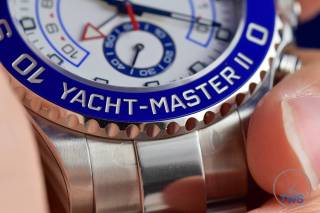 Watch in hand with bezel in focus - Rolex Yachtmaster II- Hands-On Review [116680]